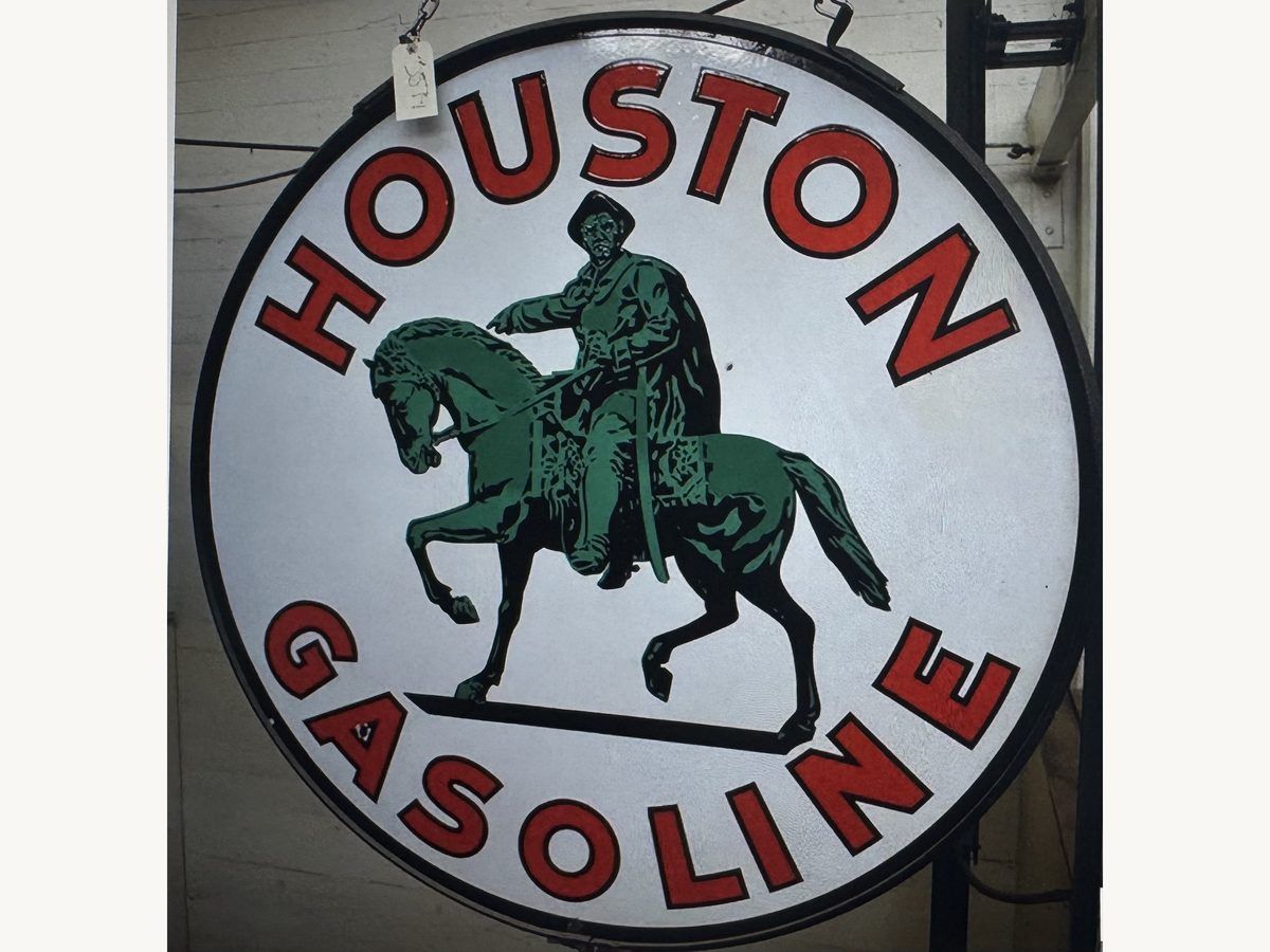 Round Houston Gasoline porcelain sign with red lettering and a green horse-and-rider logo